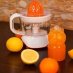 Presse Agrumes Électrique 0.7L 25W Boommax – عصارة كهربائية 0.7 لتر